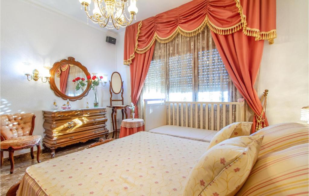 A bed or beds in a room at 4 Bedroom Beautiful Home In Lorca