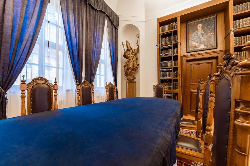 Postel nebo postele na pokoji v ubytování Nové Adalbertinum