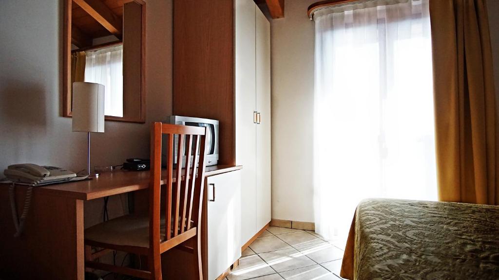 Postel nebo postele na pokoji v ubytování Alla Nave