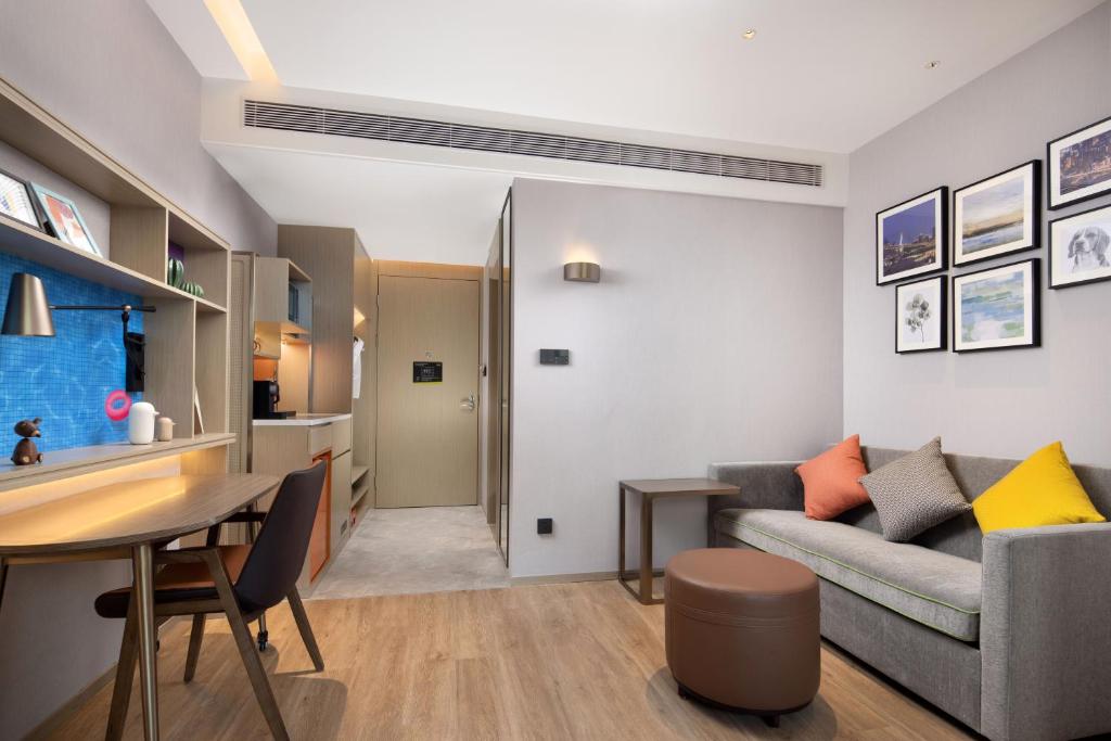 Posezení v ubytování Home2 Suites By Hilton Wuhan Xudong