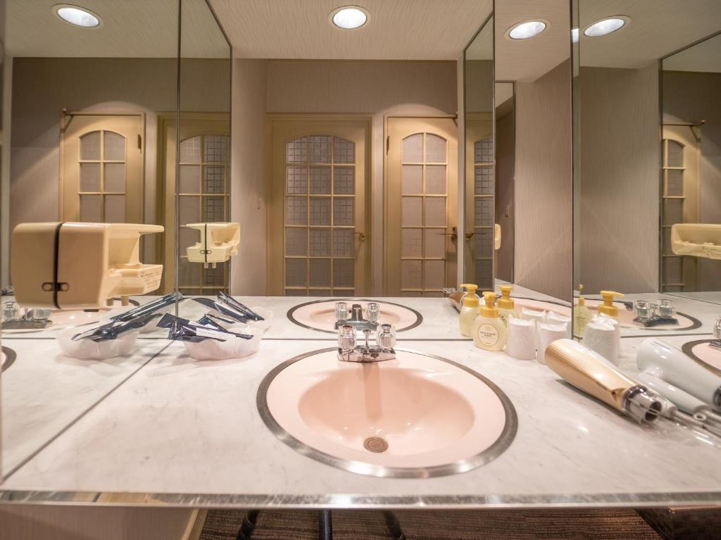 Koupelna v ubytování Tabist Hotel Rakuserina