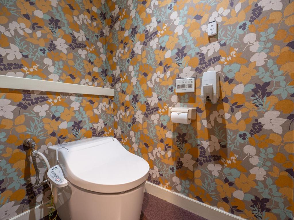 Koupelna v ubytování Tabist Hotel Rakuserina