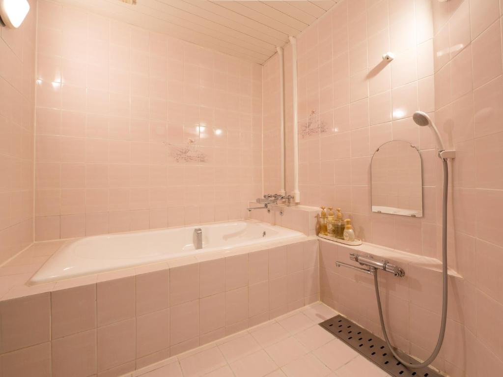 Koupelna v ubytování Tabist Hotel Rakuserina