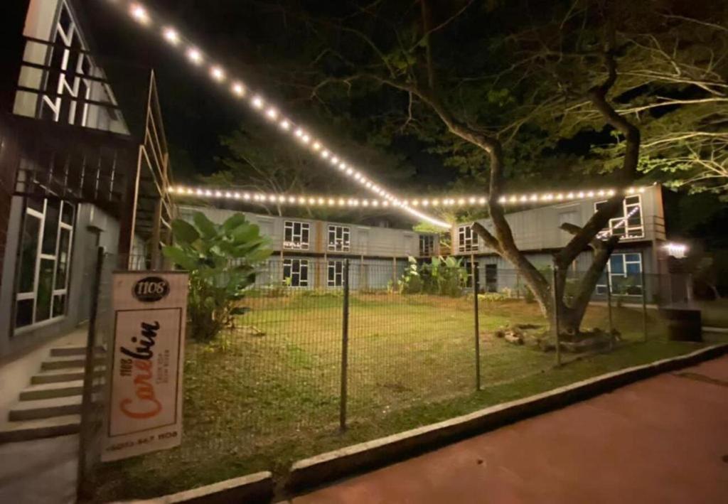 a building with lights on the side of it at night at 1108 Carebin Slim River in Slim River