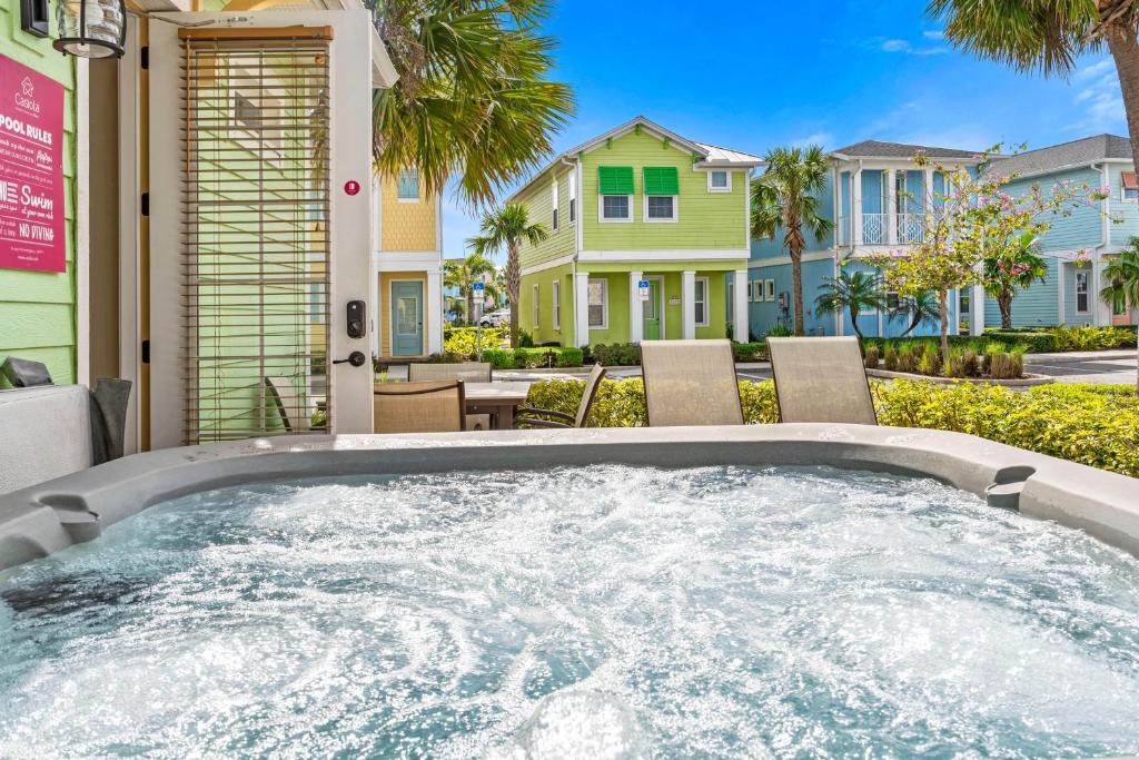a hot tub in the backyard of a house at 3000 Latitude Lane in Orlando