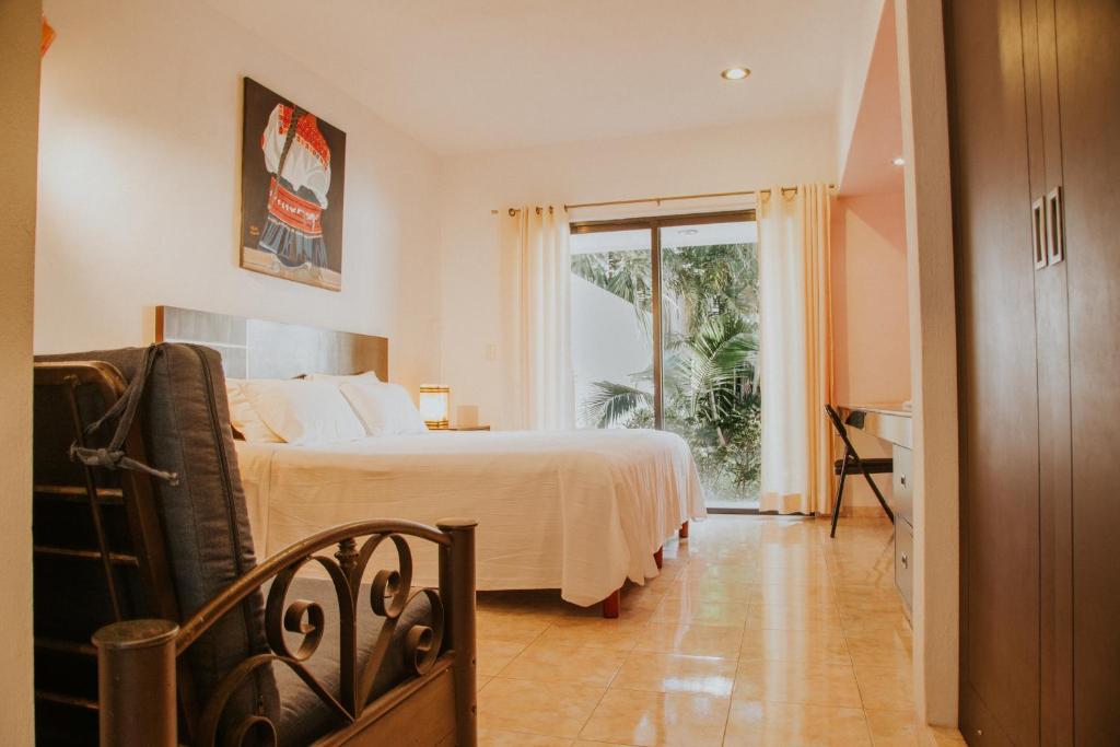 Postel nebo postele na pokoji v ubytování Hotel Holly