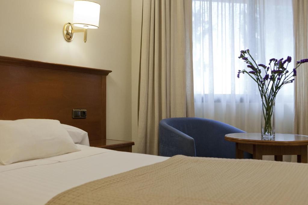 Postel nebo postele na pokoji v ubytování Porcel Alixares