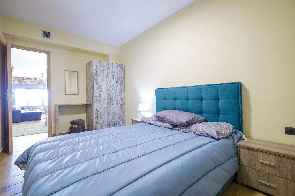 Posteľ alebo postele v izbe v ubytovaní Maritinas Stone House & Apartment On The Beach