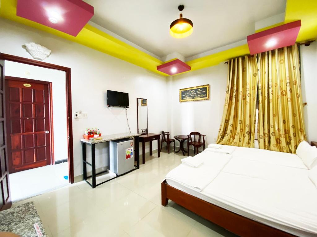 เตียงในห้องที่ Ngoc Kha Tu 1 Hotel