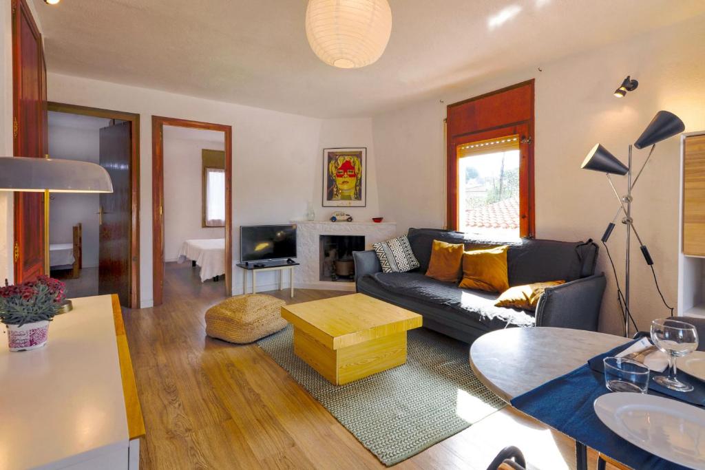A seating area at Flor casa con piscina privada