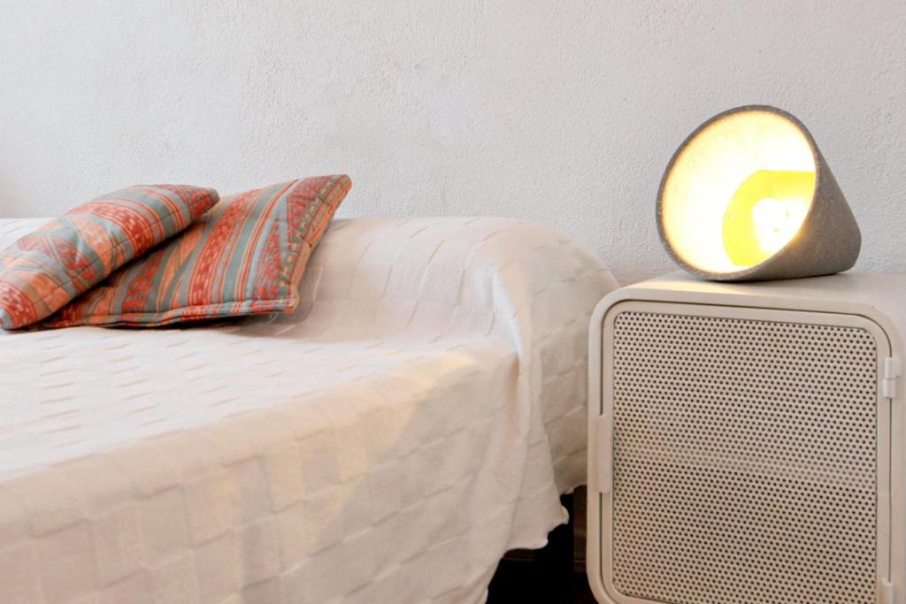 A bed or beds in a room at Flor casa con piscina privada