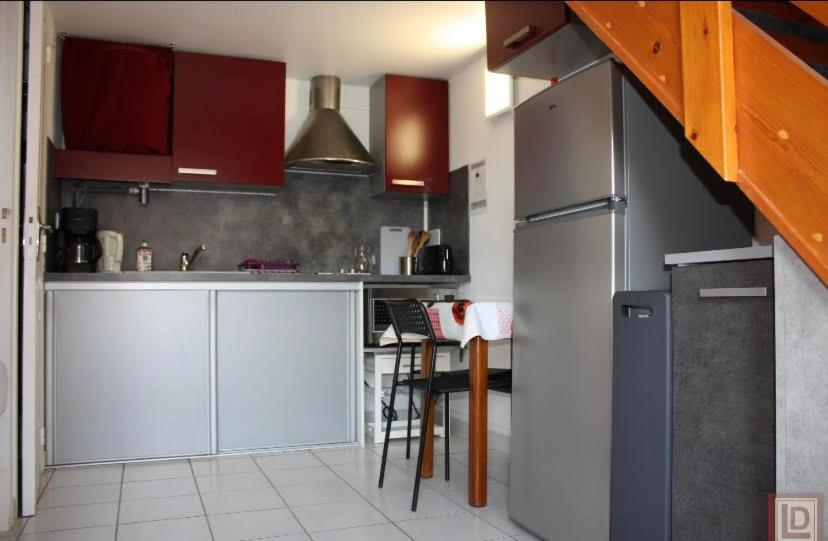 Kuchyňa alebo kuchynka v ubytovaní Pavillons 7 et 56 Narbonne Plage