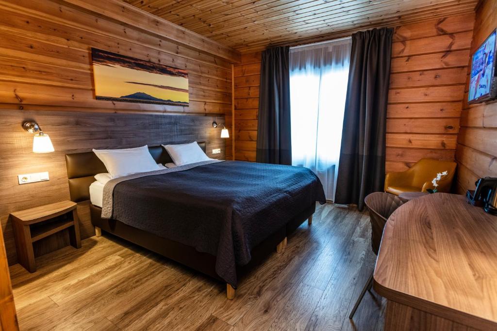 Uma cama ou camas num quarto em Lighthouse-Inn