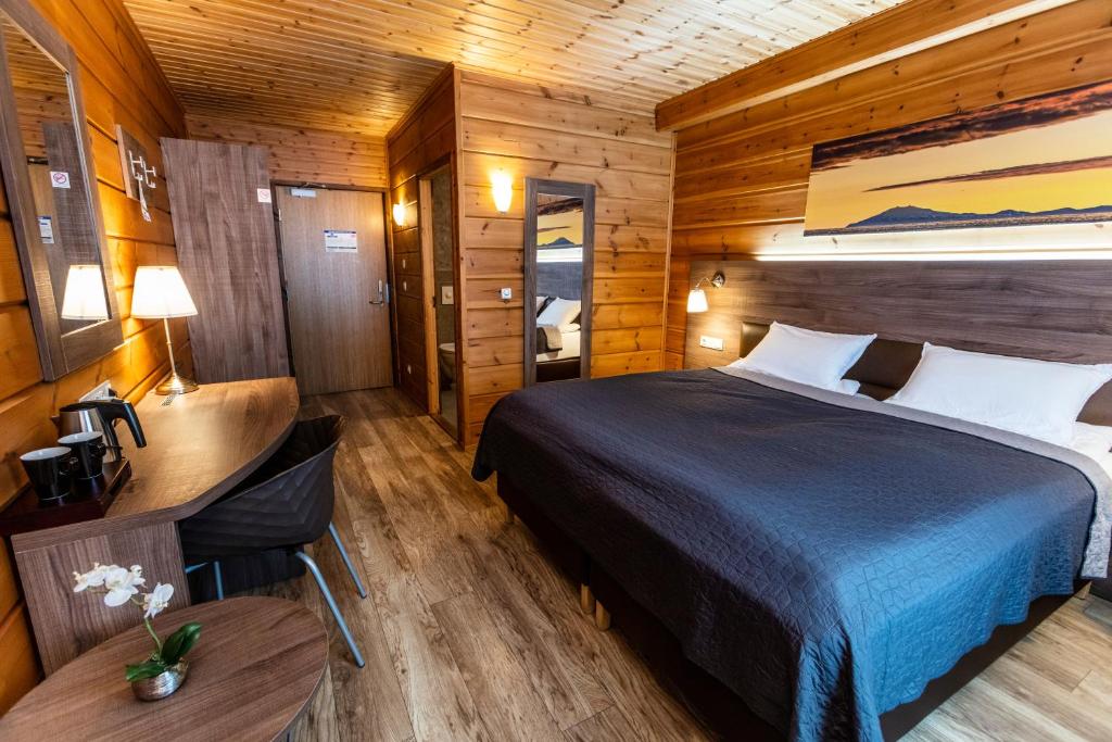 Uma cama ou camas num quarto em Lighthouse-Inn