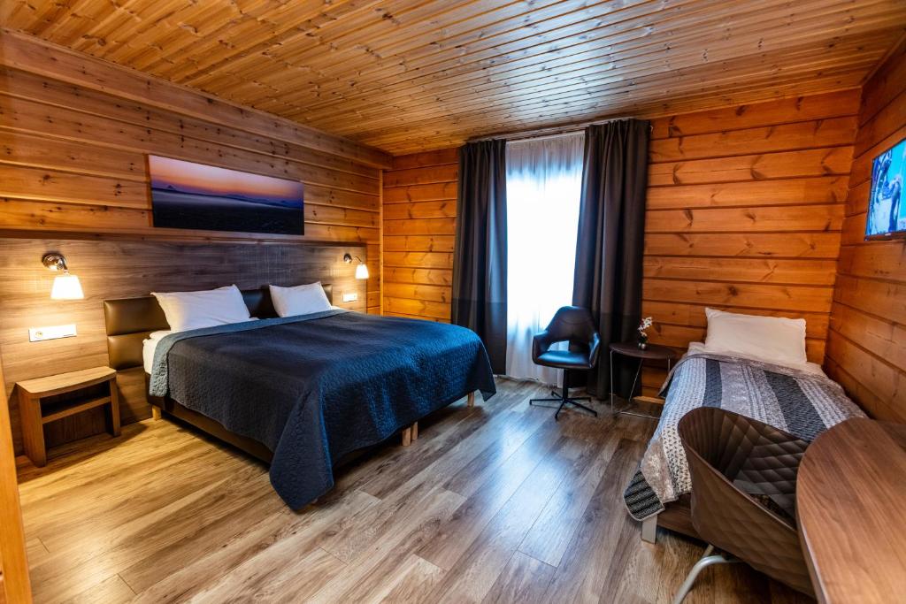 Uma cama ou camas num quarto em Lighthouse-Inn