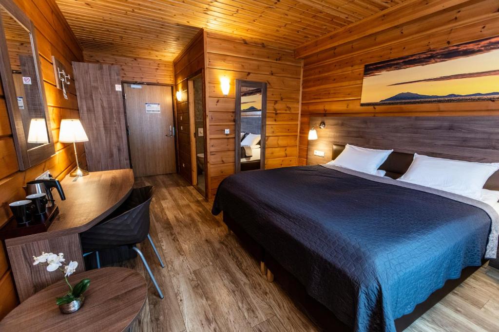 Uma cama ou camas num quarto em Lighthouse-Inn