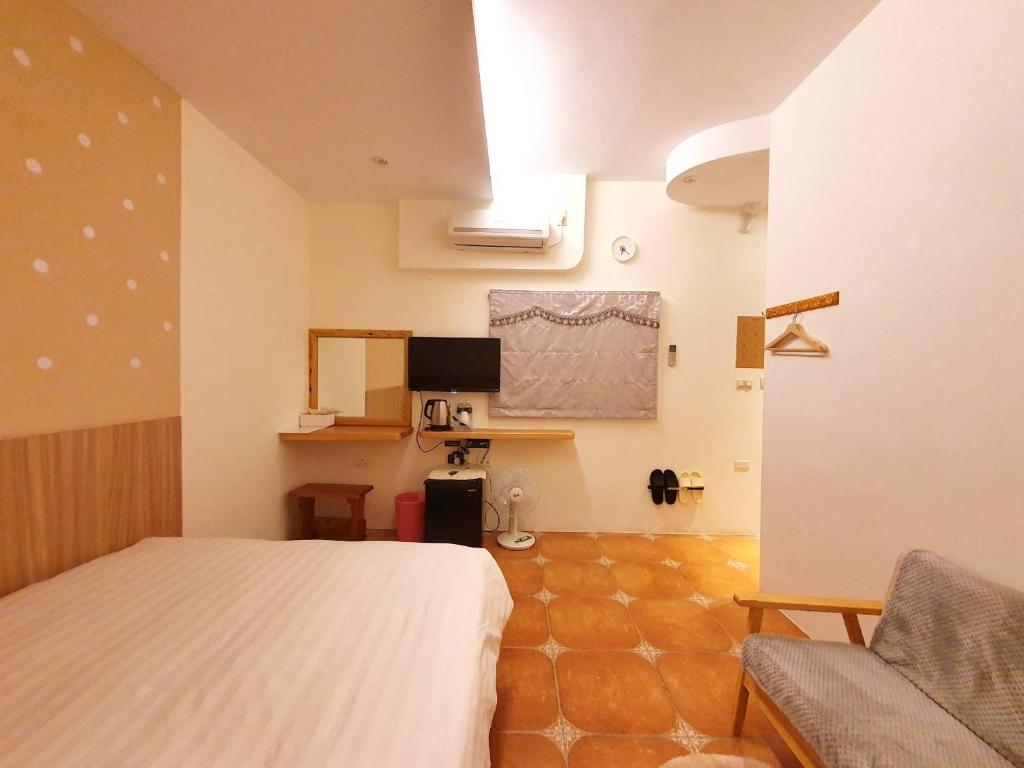Katil atau katil-katil dalam bilik di Warm & Cozy Inn
