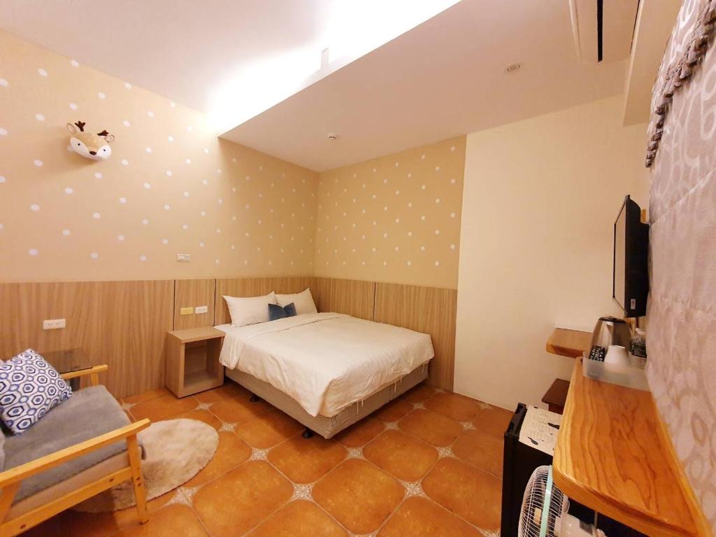 Katil atau katil-katil dalam bilik di Warm & Cozy Inn