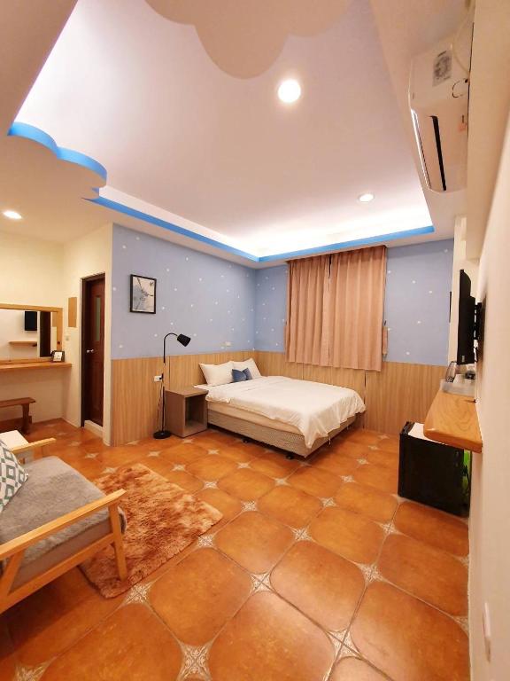 Katil atau katil-katil dalam bilik di Warm & Cozy Inn