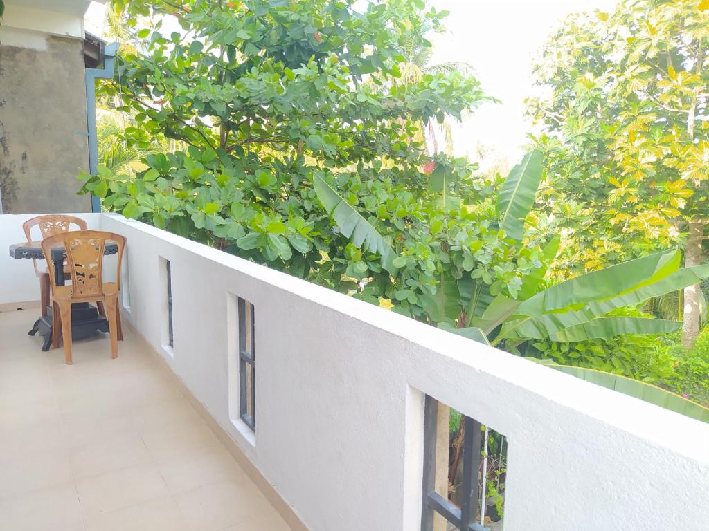 Balkón nebo terasa v ubytování Hostel Residence Bentota