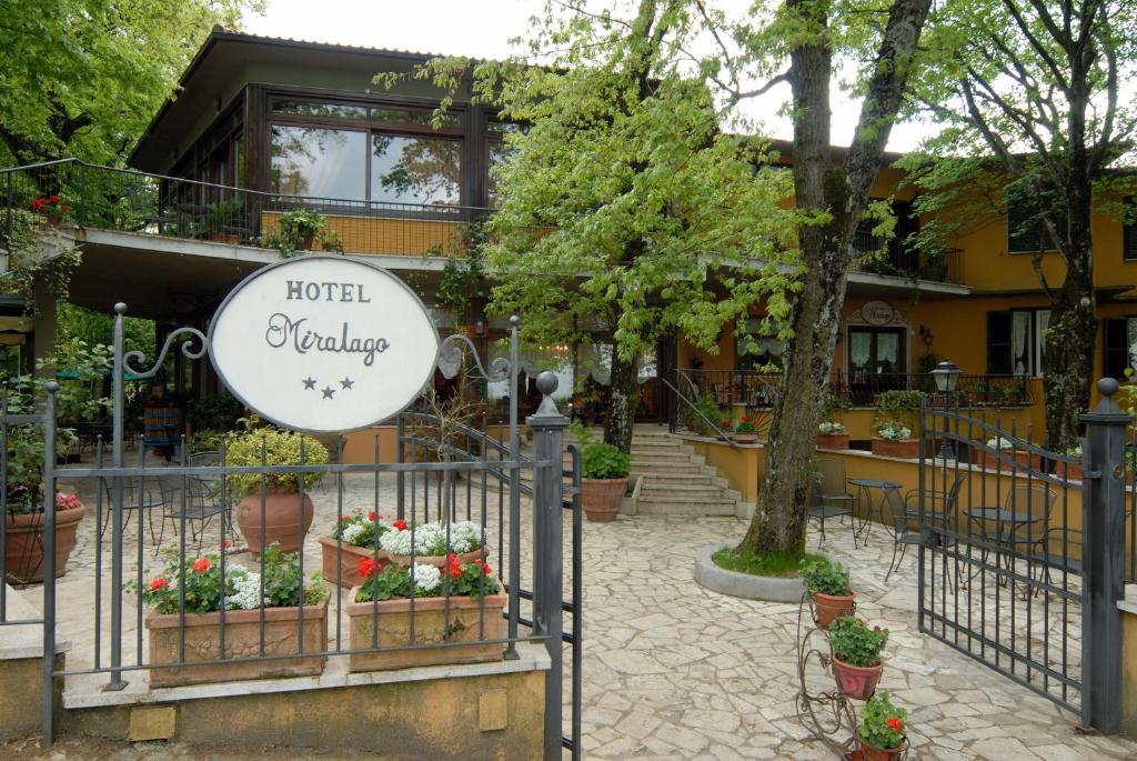 a hotel awakening sign in front of a building at Miralago in Albano Laziale