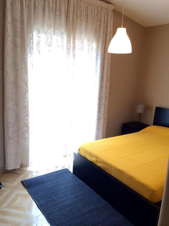 Postel nebo postele na pokoji v ubytování Terra Di Mare