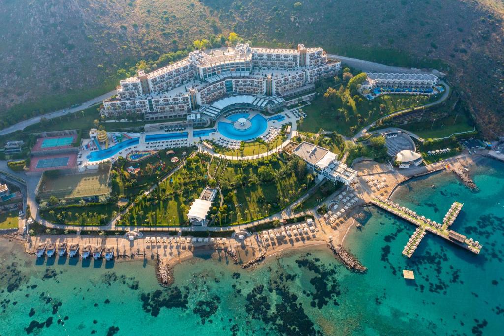 an aerial view of a resort on the water at Kefaluka Resort in Akyarlar