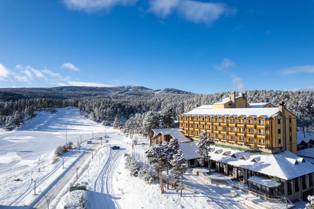 an aerial view of a hotel in the snow at Duja Chalet Ski Center in Sarıkamıs