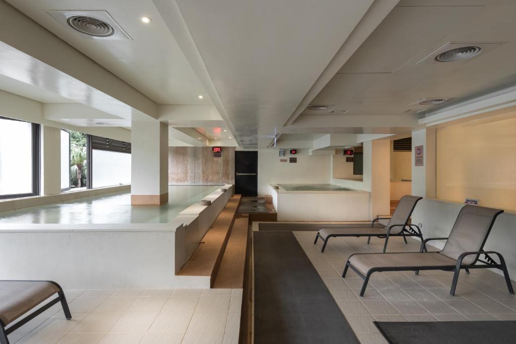 a waiting room with chairs and a waiting area at Beitou Sweet Me Hot Spring Resort in Taipei