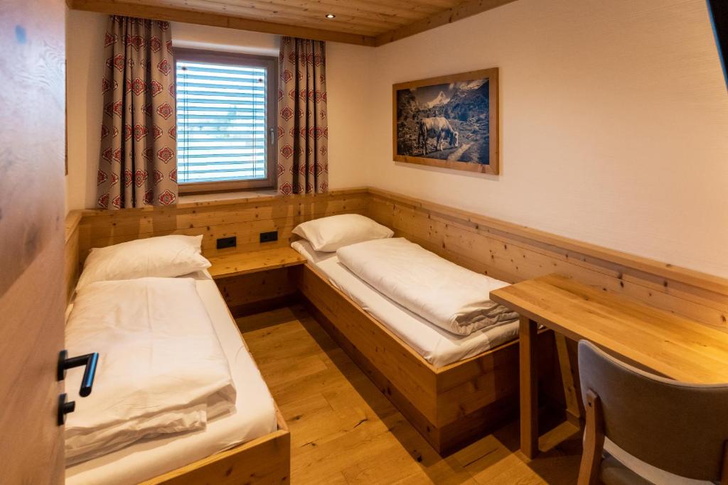 Posteľ alebo postele v izbe v ubytovaní Madlhof