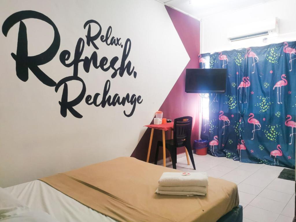 Postel nebo postele na pokoji v ubytování T FAMILY HOTEL