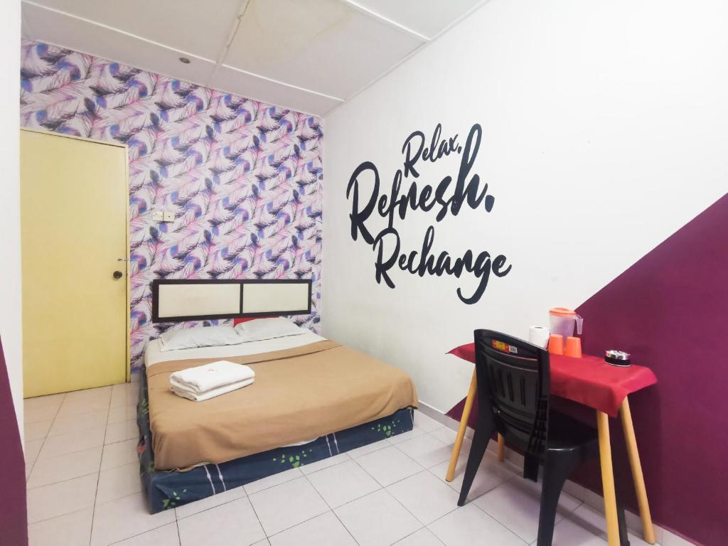 Postel nebo postele na pokoji v ubytování T FAMILY HOTEL