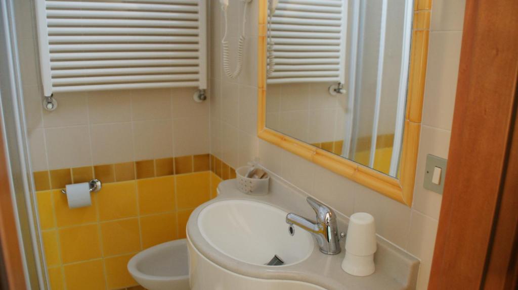 Koupelna v ubytování Hotel Verudella