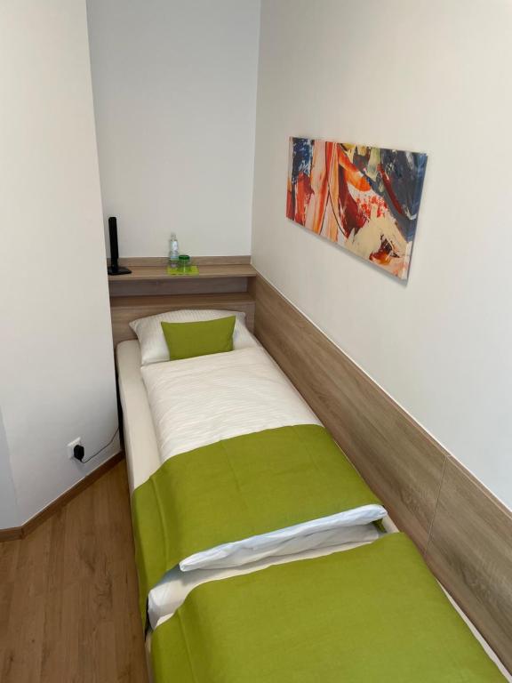 Postel nebo postele na pokoji v ubytování Hotel Garni Ilys Inn