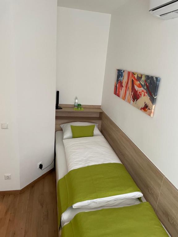 Postel nebo postele na pokoji v ubytování Hotel Garni Ilys Inn