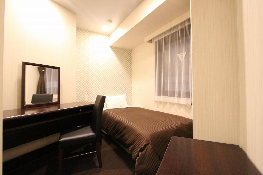 TV a/nebo společenská místnost v ubytování HOTEL LiVEMAX Nihonbashi Hakozaki