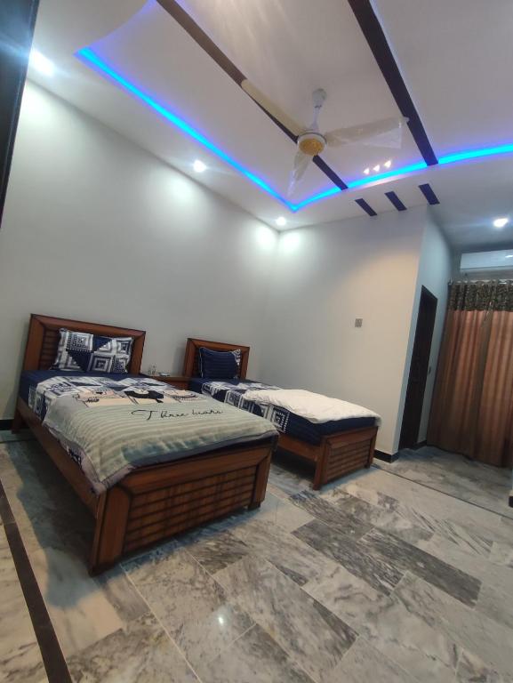 Fasil-Town Rooms Near Isb Air port - Deluxe Family Room