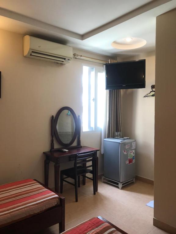 TV a/nebo společenská místnost v ubytování Kim Hotel