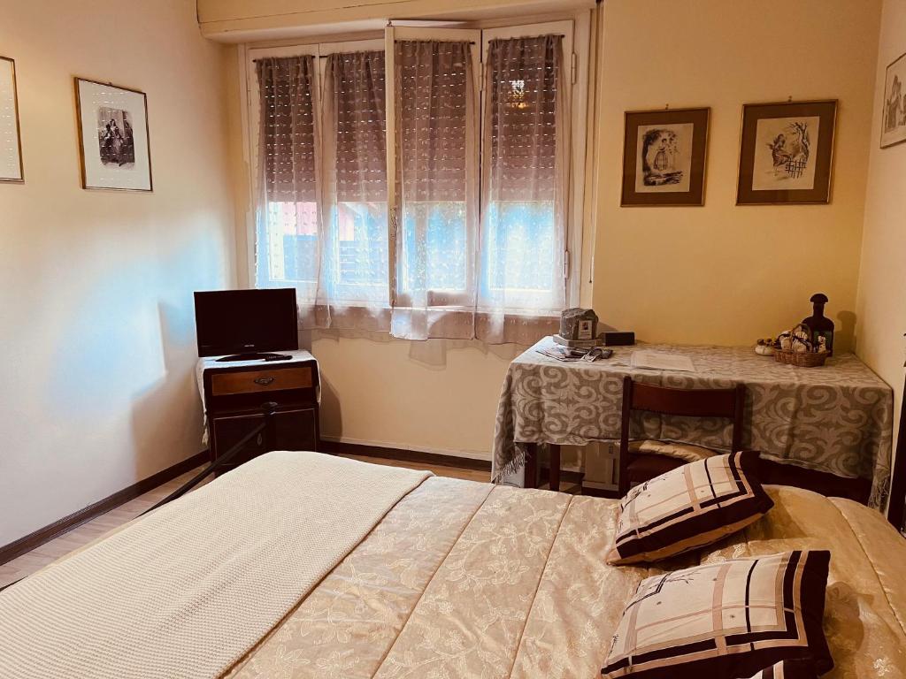 Postel nebo postele na pokoji v ubytování Bed&breakfast Benedetta