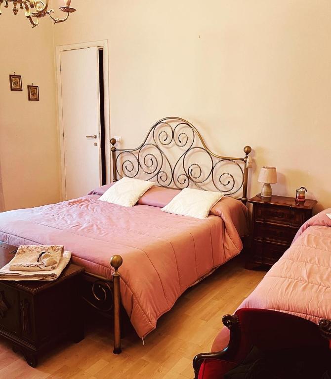 Postel nebo postele na pokoji v ubytování Bed&breakfast Benedetta