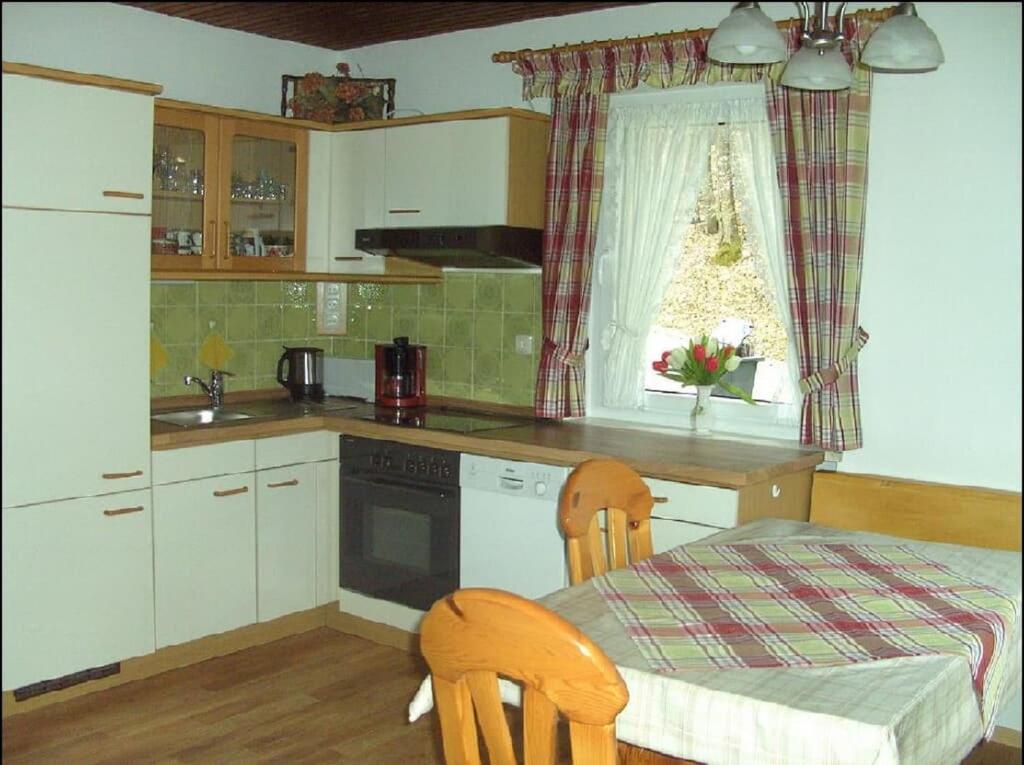 Kuchyň nebo kuchyňský kout v ubytování Ferienhof Fernblick