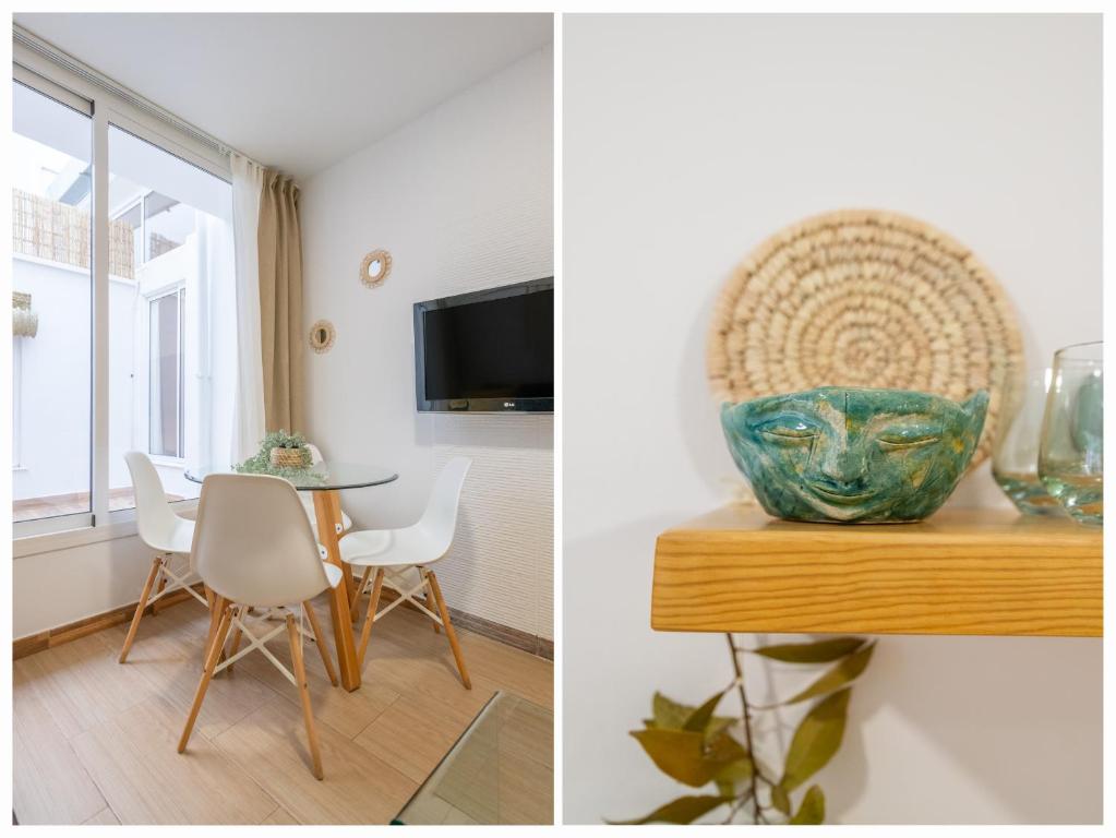 Televízia a/alebo spoločenská miestnosť v ubytovaní ALMA HOUSES