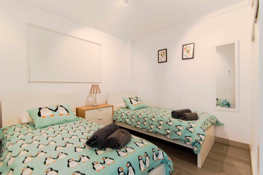 Posteľ alebo postele v izbe v ubytovaní Apartamento con vistas al mar y al lado de todo