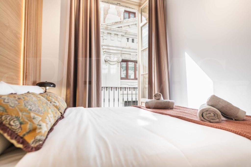 Posteľ alebo postele v izbe v ubytovaní Classy apartment in the heart of Malaga by REMS