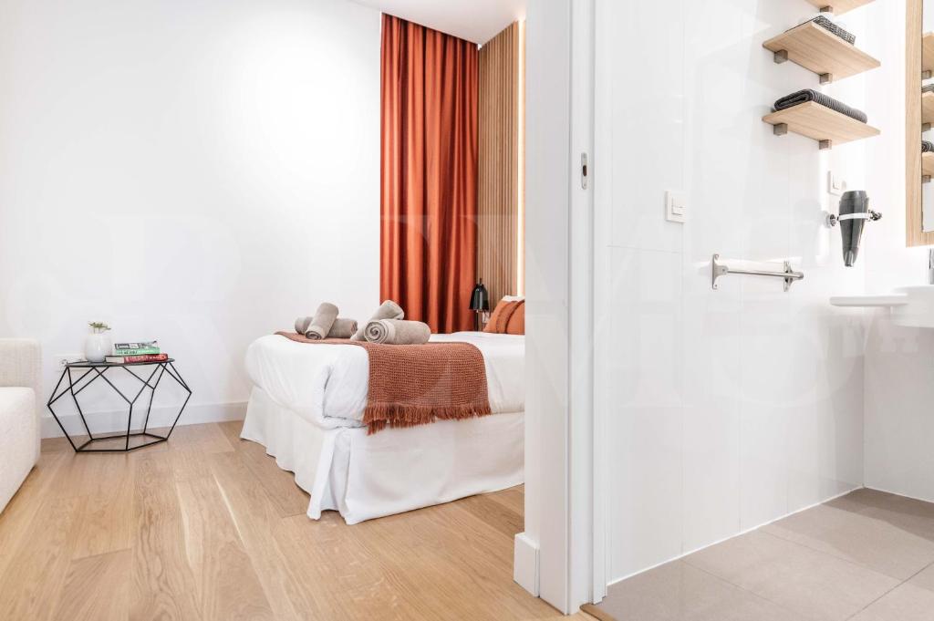 Posteľ alebo postele v izbe v ubytovaní Classy apartment in the heart of Malaga by REMS