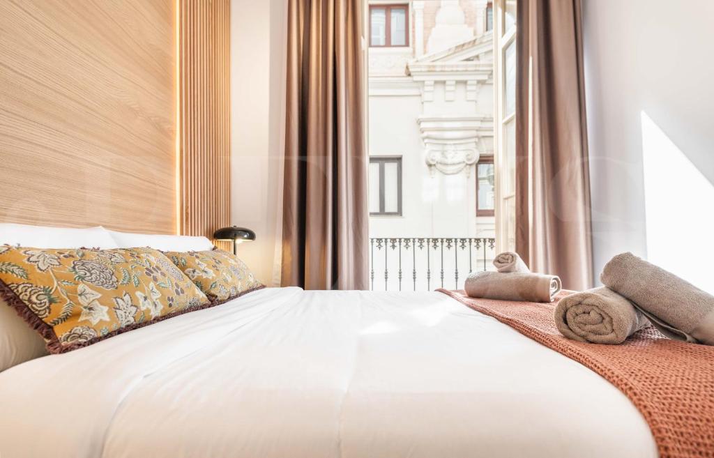 Posteľ alebo postele v izbe v ubytovaní Classy apartment in the heart of Malaga by REMS