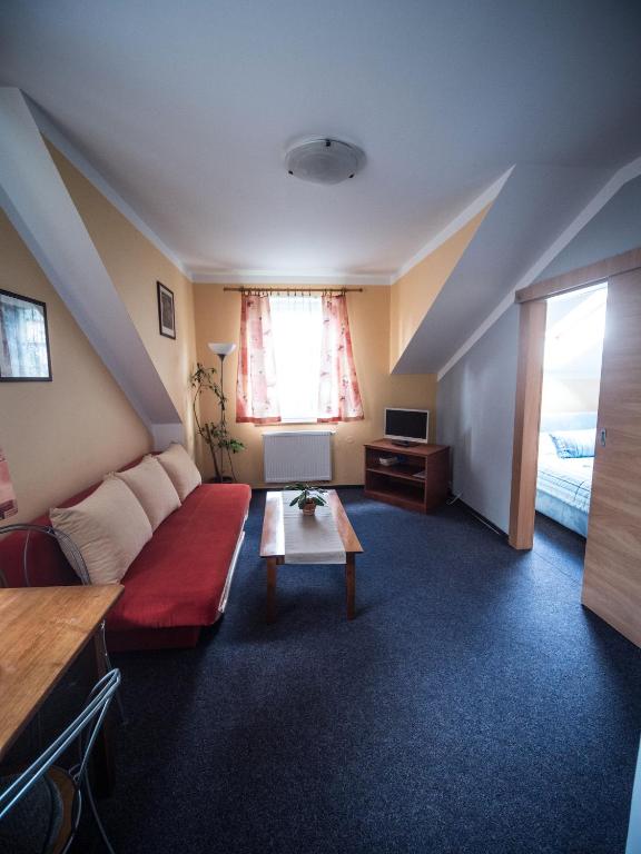 Posezení v ubytování Hotel Holzbecher Ratibořice