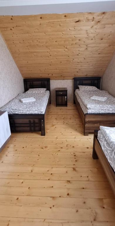 Postel nebo postele na pokoji v ubytování Betegi Guest House