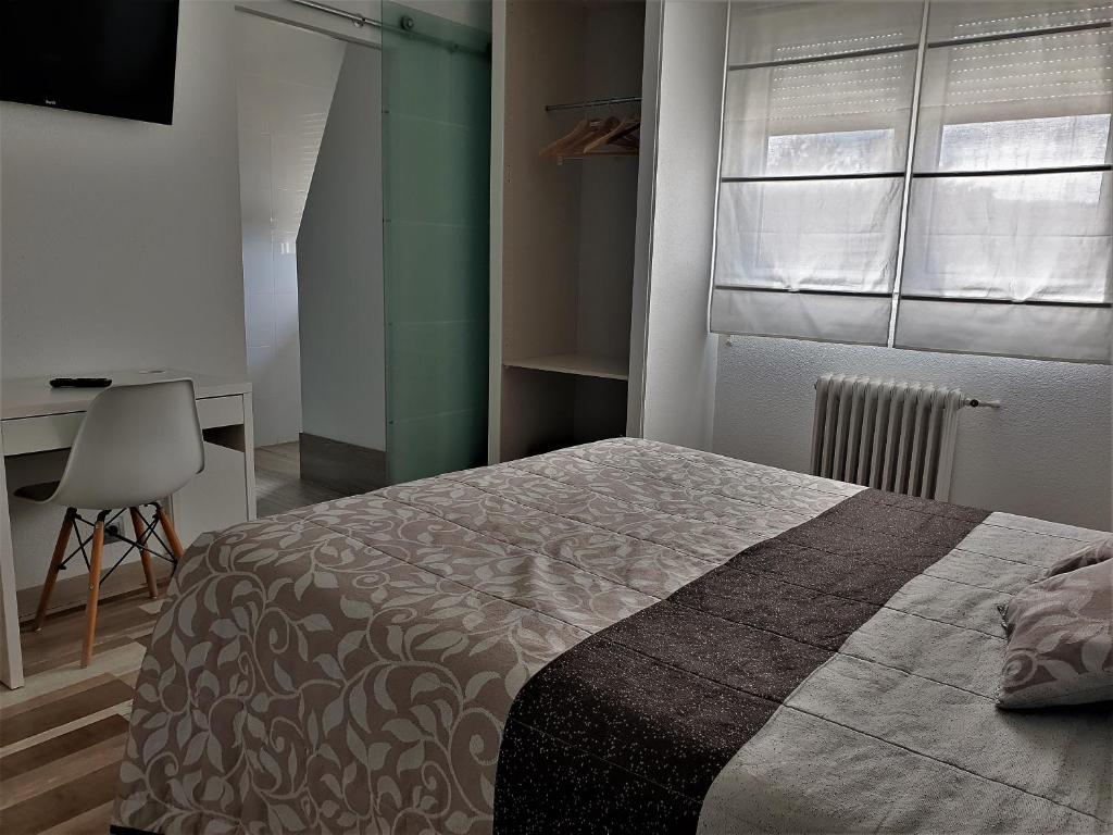 Postel nebo postele na pokoji v ubytování Hotel Area Serrano