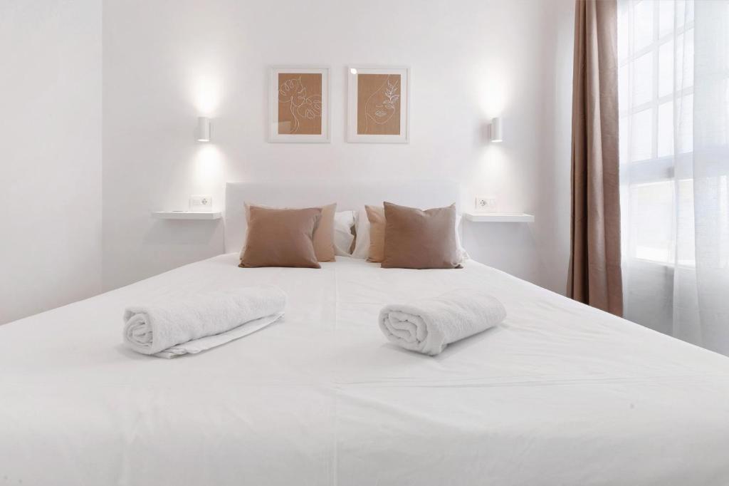 Postel nebo postele na pokoji v ubytování Bungalow Carpe Diem Capri